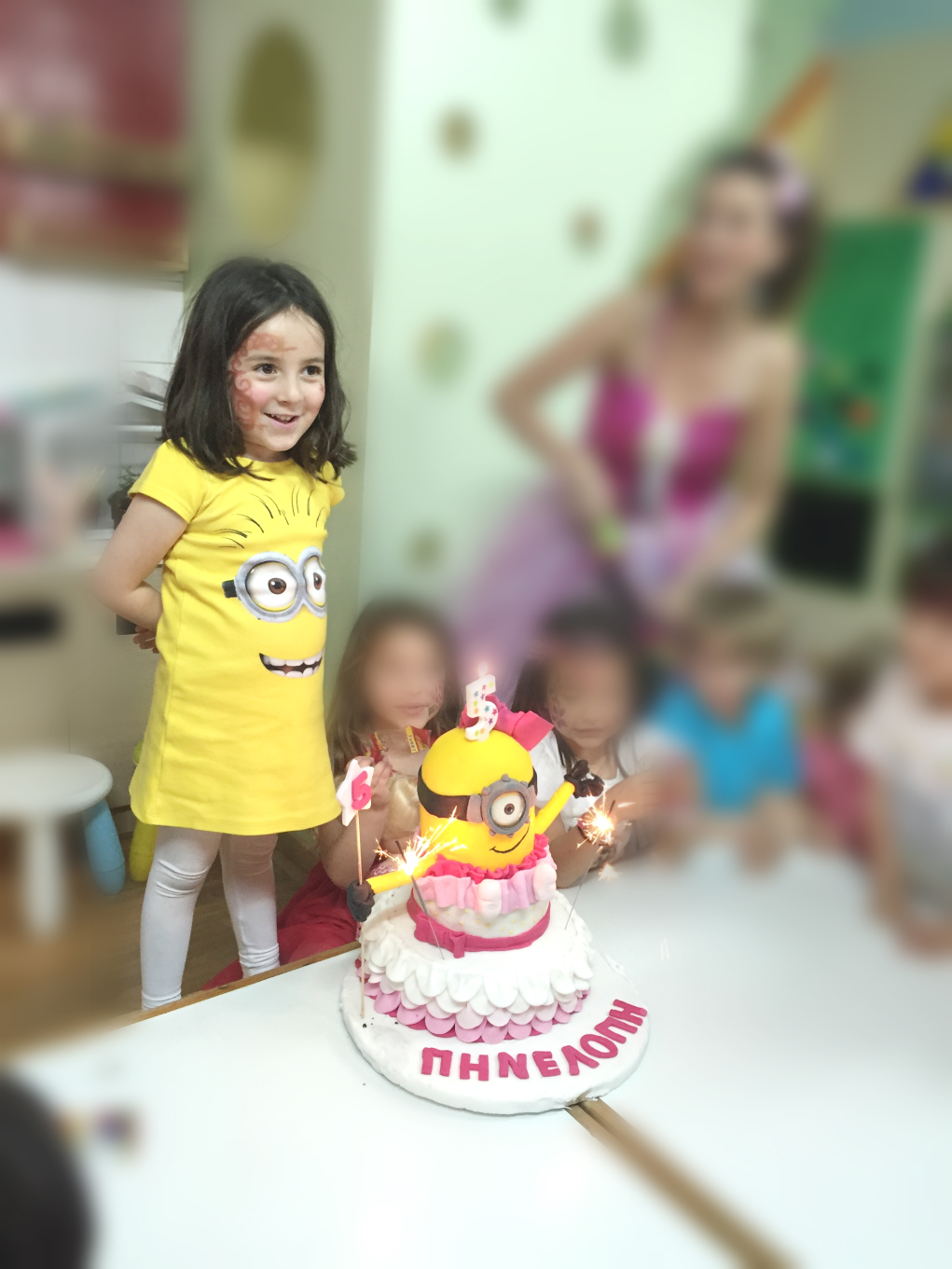 girl minion party cake